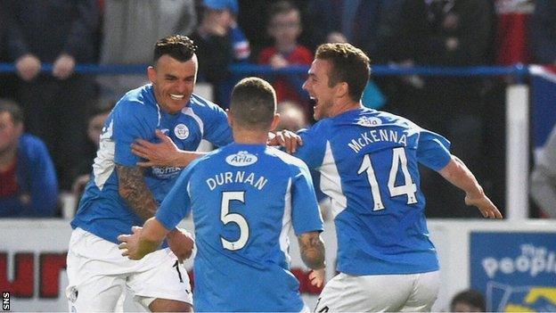 Derek Lyle (left) celebrates having opened the scoring for Queens against Rangers