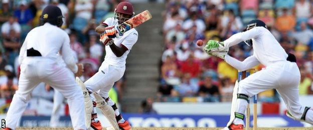 Jos Buttler misses a stumping