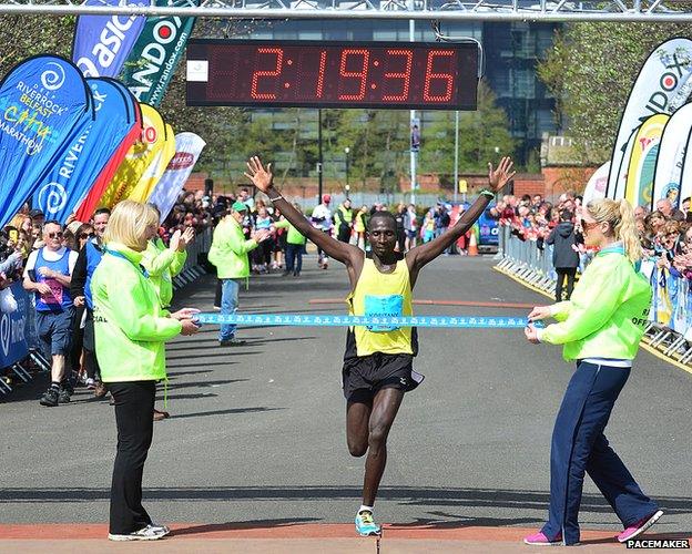 Kenyan Joel Kipsang Kositany crosses the finish line