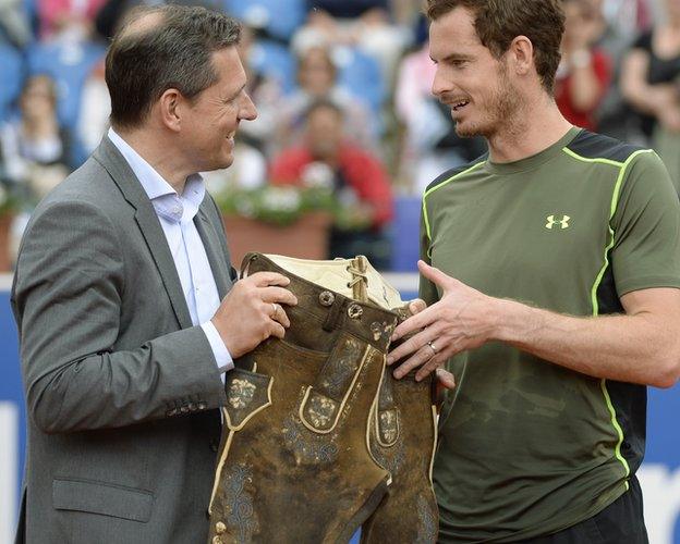 Andy Murray wins Munich Open, presented with a pair of lederhosen