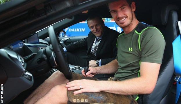 Andy Murray wins Munich Open, presented with a pair of lederhosen