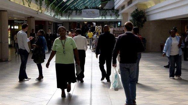 People walk trough the main alleys of the Sandton City shopping centre on 18 May 2010 in Johannesburg, South Africa.