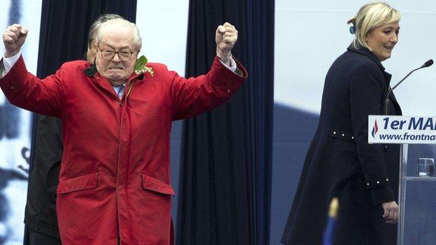 France's far-right political party Front National (FN) founder and honorary president, Jean-Marie Le Pen, on stage on during the party's annual rally in honour of Joan of Arc on 1 May 2015 as FN's president Marine Le Pen looks on