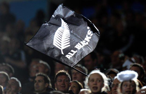 A New Zealand All Black flag is flown during the 2011 Rugby World Cup semi-final match Australia vs New Zealand at Eden Park Stadium in Auckland on 16 October 2011.