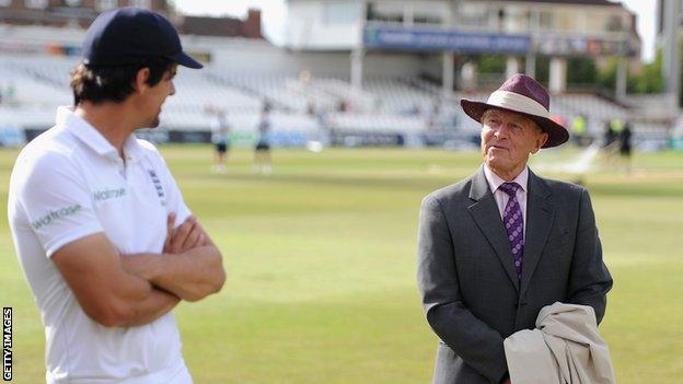 England captain Alastair Cook speaks with Geoffrey Boycott after drawing the first Test match against India at Trent Bridge on 13 July 2014