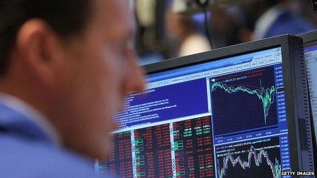 A Wall Street trader looks at his screen during the 'flash crash' on May 6 2010