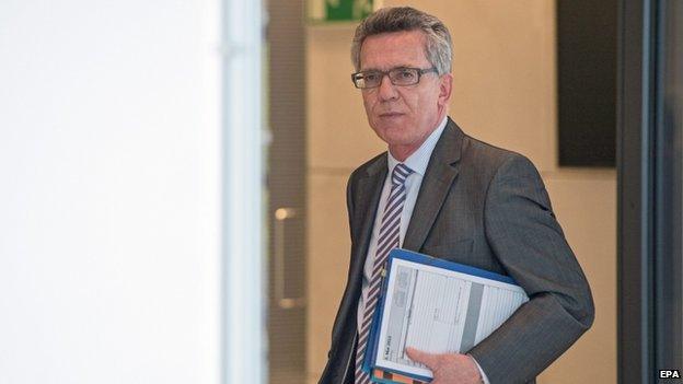 German Interior Minister Thomas de Maiziere leaves a joint faction meeting of the Christian Democrats (CDU) and its sister party Christian Social Union (CSU) in Berlin, Germany, on 5 May 2015.