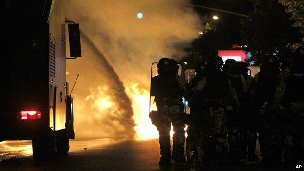 Protesters confront police outside government buildings in Skopje (5 May)