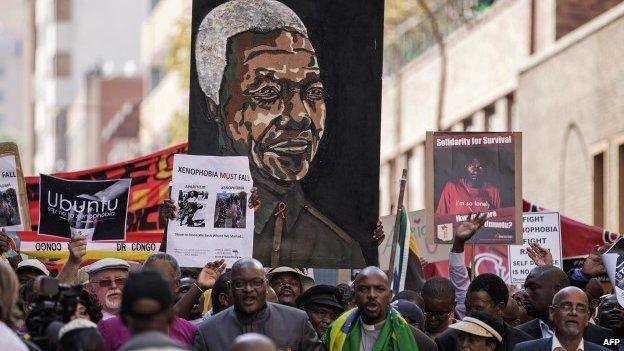 Thousands march against the recent wave of xenophobic attacks in South Africa through the streets of Johannesburg on 23 April 2015