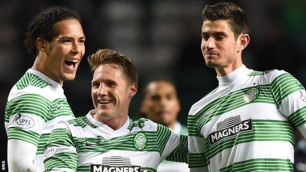 Virgil van Dijk, Kris Commons and Nir Bitton celebrate