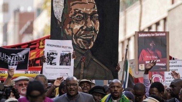 Thousands march against the recent wave of xenophobic attacks in South Africa through the streets of Johannesburg on 23 April 2015