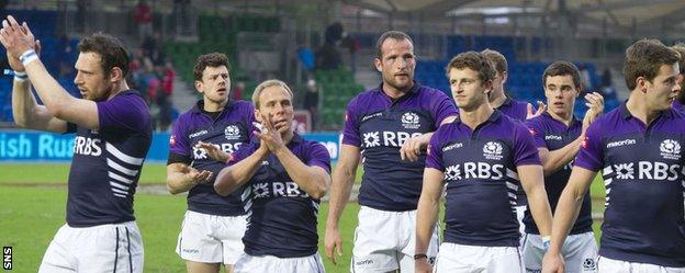 Scotland Sevens applaud the crowd at Scotstoun