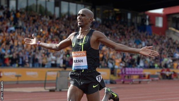 Mo Farah celebrates winning the Mens 2 mile during the Sainsbury's Birmingham Grand Prix in 2014