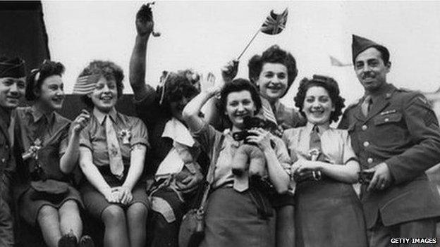 American soldiers joining in the VE Day party in 1945