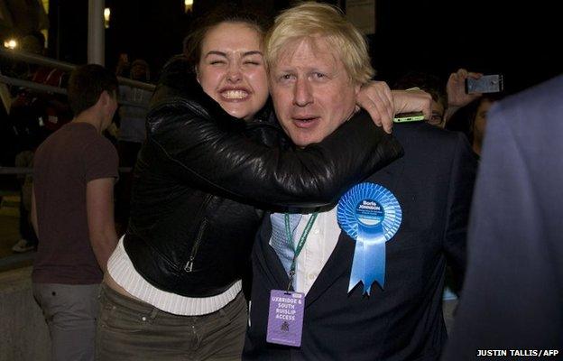 Boris Johnson receives a hug from a supporter