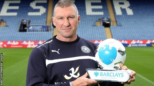 Leicester boss Nigel Pearson with his manager of the month trophy