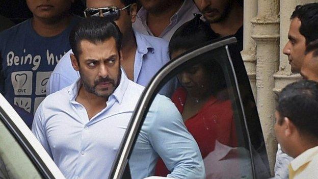 Bollywood actor Salman Khan leaves home for court in Mumbai, India, Friday, May 8, 2015.