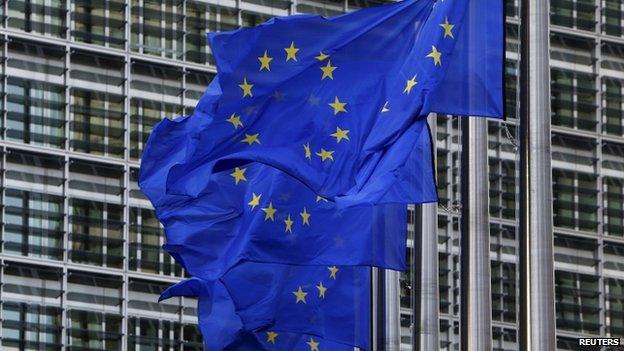 European Union flags flutter outside the EU Commission headquarters in Brussels