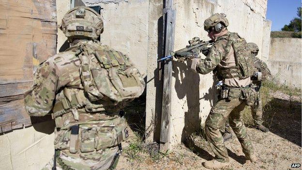 Prince Harry with other soldier