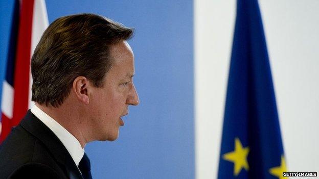 British Prime Minister David Cameron holds a press conference as part of a European Council on June 27, 2014, in Brussels