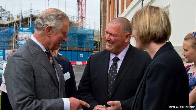 Prince of Wales meets residents of The Guinness Partnership's 250th affordable home in Poundbury