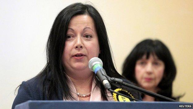 Scottish National Party"s Kirsten Oswald makes a speech after defeating Scottish Labour Party leader Jim Murphy