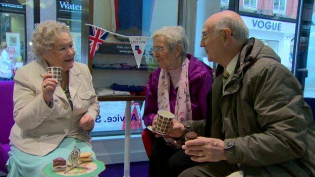 Tea and cakes were served at a VE Day anniversary party in Belfast