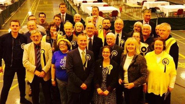 Pete Wishart poses with his SNP team at the count