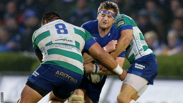 Leinster captain Jamie Heaslip is tackled by Mat Luamanu and Edoardo