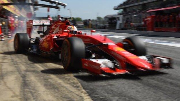 Sebastian Vettel leaves the pit lane