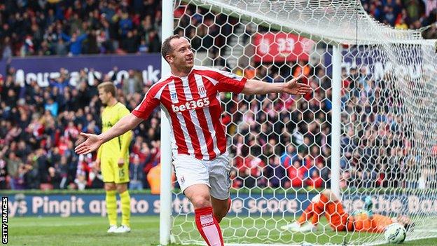 Stoke midfielder Charlie Adam celebrates scoring against Tottenham