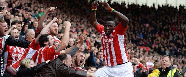 Stoke City forward Mame Biram Diouf celebrates scoring against Tottenham