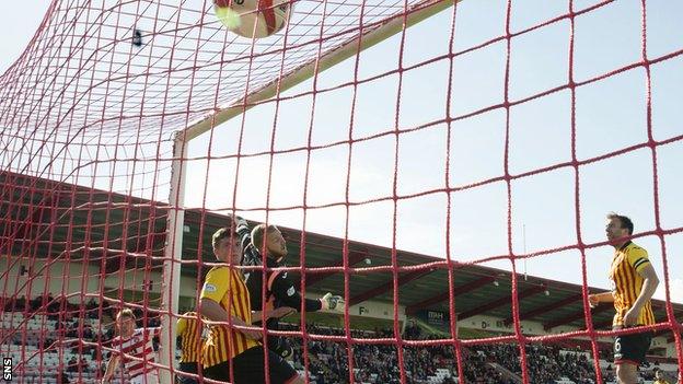 Hamilton's Greg Docherty (left) heads it home to equalise for his side