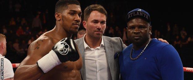 Anthony Joshua, Eddie Hearn and Kevin Johnson