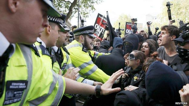 Protesters and police clash