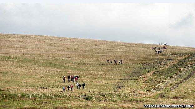 Teams trekking across the moor