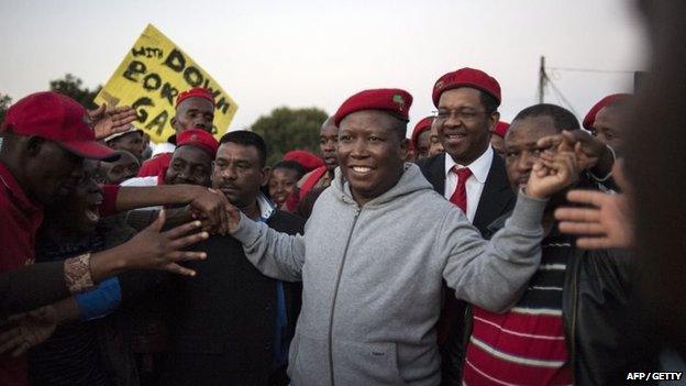 South African opposition party Economic Freedom Fighters (EFF) leader Julius Malema arrives to give a speech in Alexandra Township, as part of an anti-foreigner violence campaign on 20 April 2015 in Johannesburg.