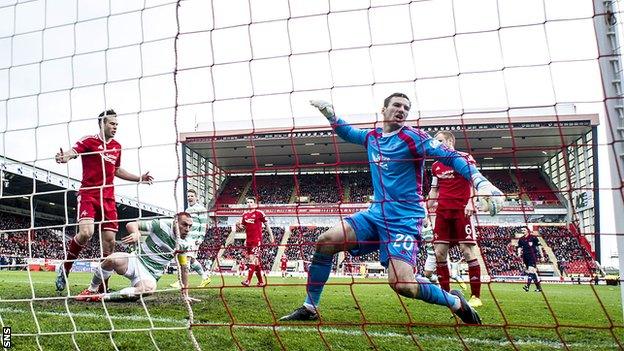 Celtic captain Scott Brown (grounded) scored the only goal of the game