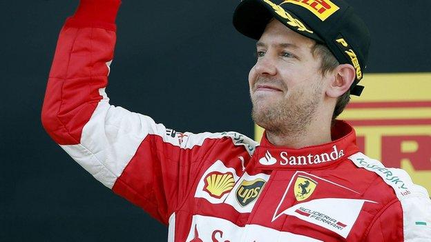 Sebastian Vettel celebrates his podium finish in the Spanish GP