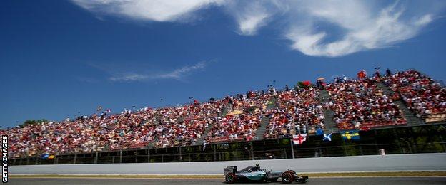 Nico Rosberg crosses the finish line