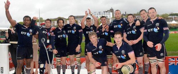 The Scotland players wave to the stand after being defeated in the Plate Final