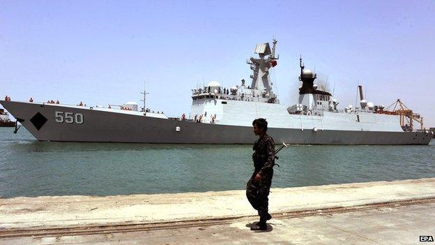 A Yemeni soldier keeps watch on the Chinese frigate, the Weifang, during an evacuation of Chinese people from Yemen in the western port city of Hodeidah, Yemen, on 30 March 2015