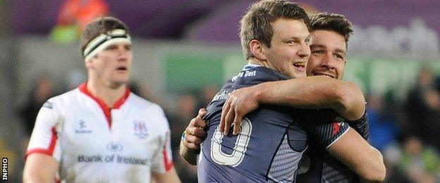 Dan Biggar congratulates Ospreys try-scorer Rhys Webb in December's game against Ulster