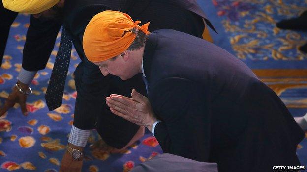 David Cameron takes part the Vaisakhi Festival at Guru Nanak Darbar Gurdwara in Gravesend