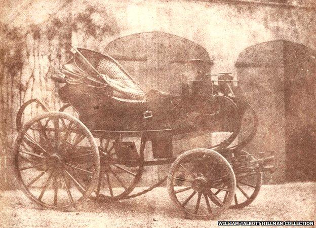 Carriage in the courtyard of Lacock Abbey. Salt print from a calotype negative, April 1844.