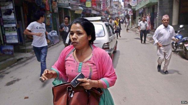 Nepalese search for open space as a strong earthquake hits Kathmandu, Nepal, 12 May 2015.