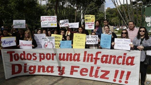 People protest against child abuse in downtown Asuncion on 11 May 2015.