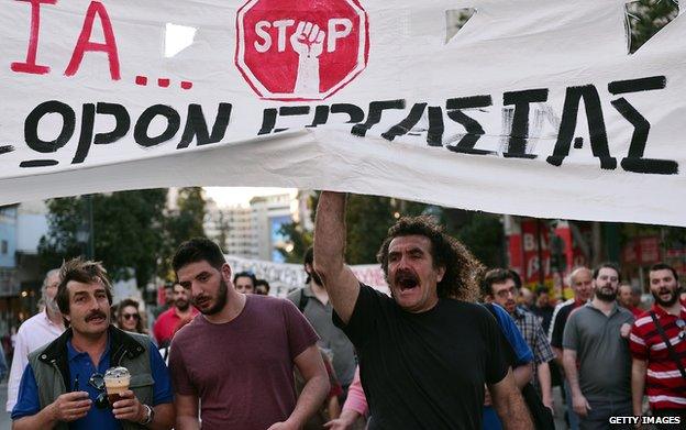 Protesters in central Athens demand jobs and allowances for all the unemployed on 8 May 2015.