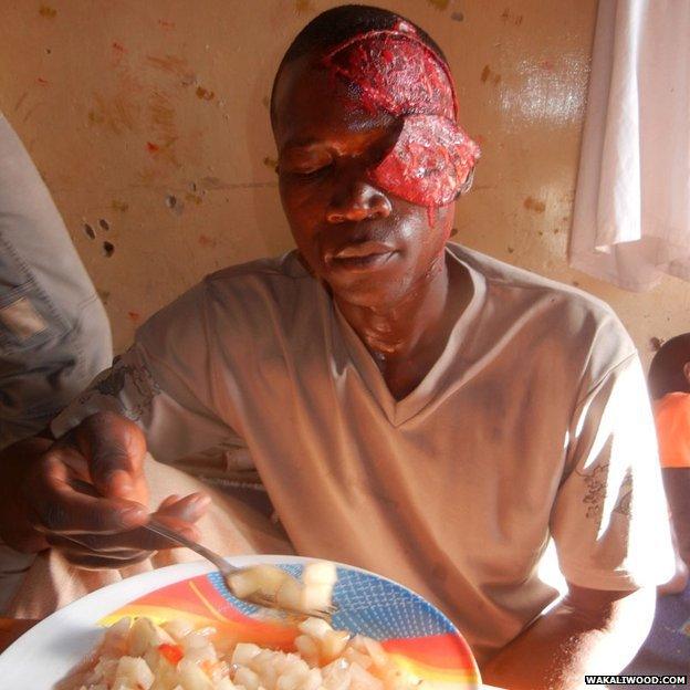 An actor has lunch in full horror make-up