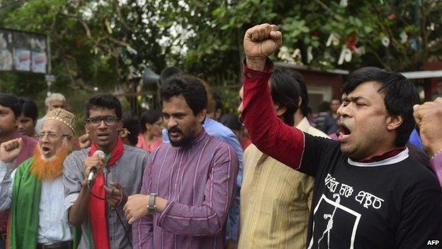 Bangladeshi secular activists celebrate after a review petition relating to the case of a Jamaat-e-Islami political party leader was dismissed by the Supreme Court in Dhaka on April 6, 2015.